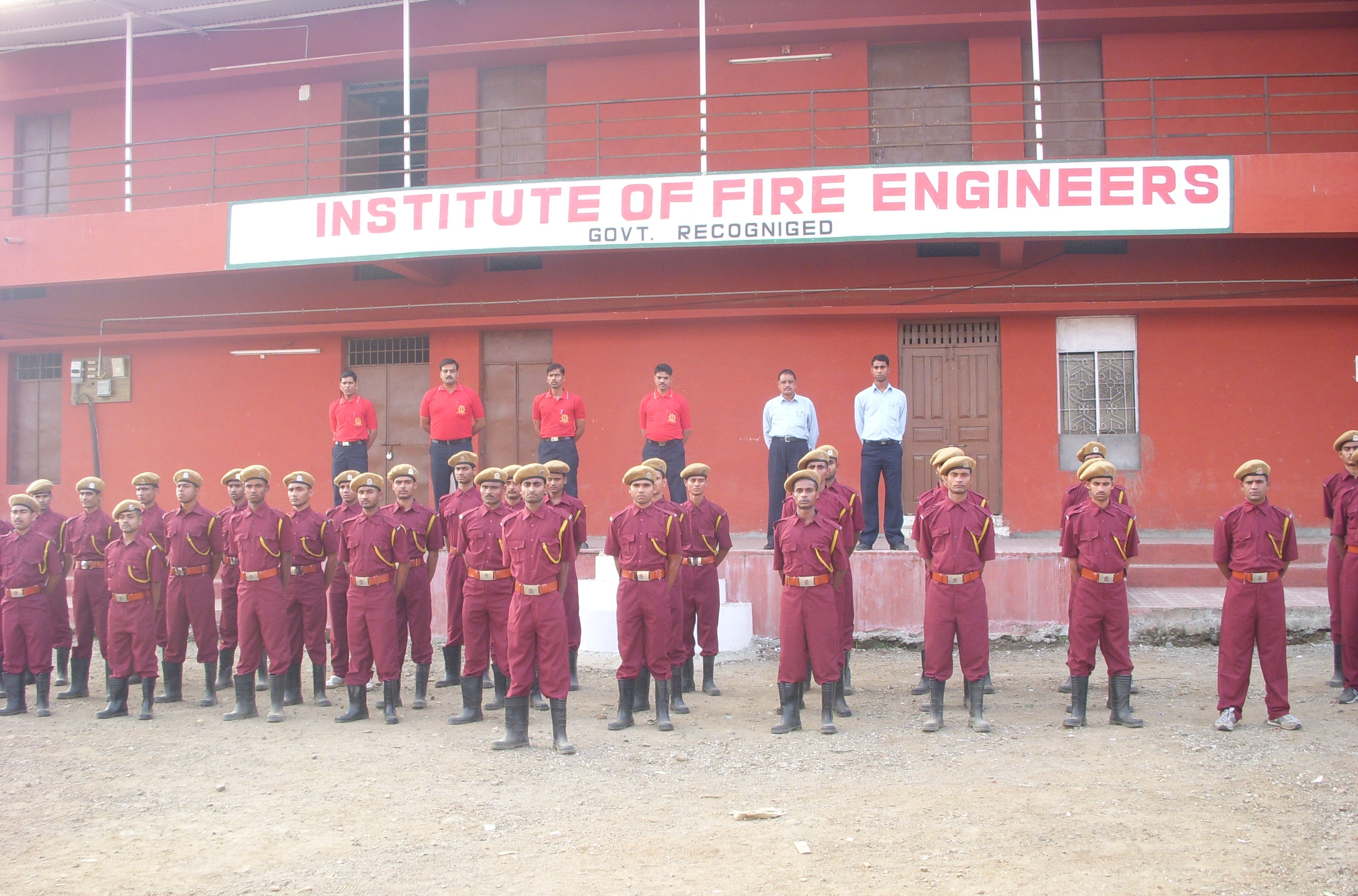 Students in uniform at IFE building